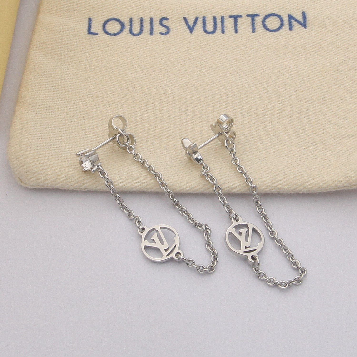petit asymmetric chain earrings petit asymmetric chain earrings